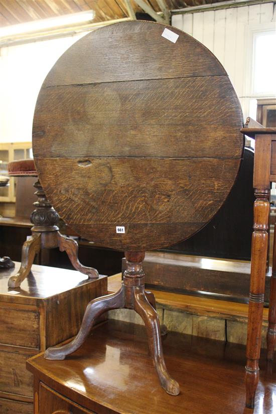 Circular oak snap top table